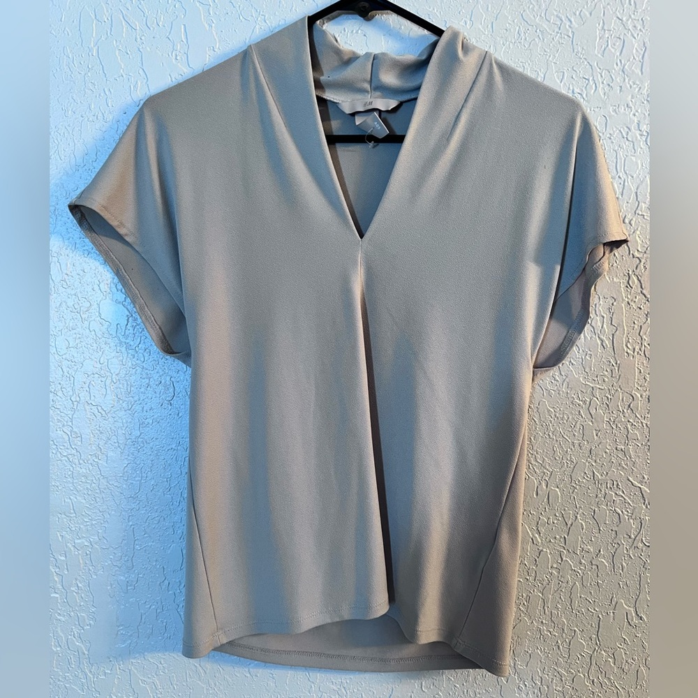 Light gray v neck blouse